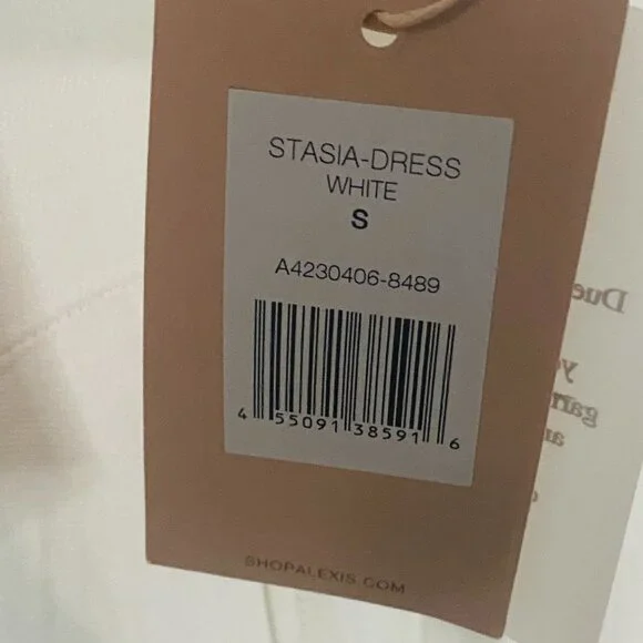 Stasia Alexis Design Sleeveless White Dress for Glamorous Occasions - Picture 13 of 17